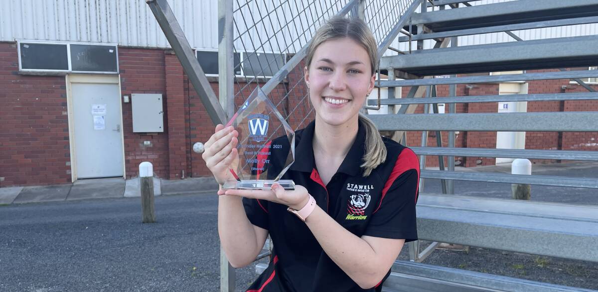 SMILE: Molly Orr with her WFNL 17 and Under best and fairest trophy. Picture: TALLIS MILES