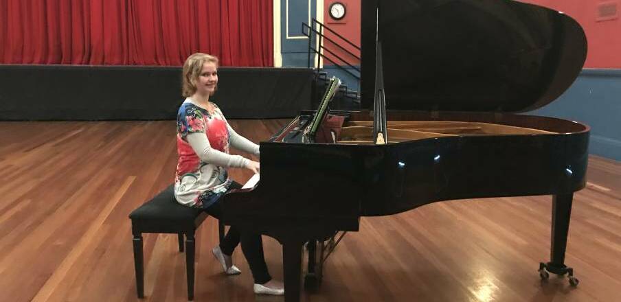 GRAND: In 2019 SPACi member Alanis Williams was playing the grand piano in the Stawell Town Hall. Picture: CONTRIBUTED