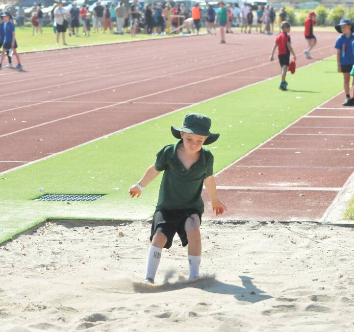 LEAP: Pomonal Primary School student Tom Whyte in the 9 year-old boys long jump. Picture: TALLIS MILES