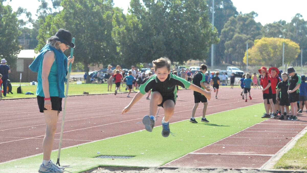 FLYING: Great Western pupil RJ Debono sets sail for his long jump attempt. Picture: TALLIS MILES