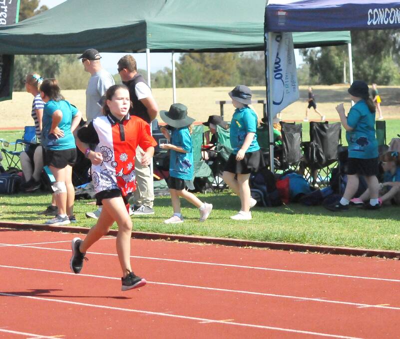 FINISHING SPRINT: Moyston pupil Hannah Dowsett strides to the finish line. Picture: TALLIS MILES