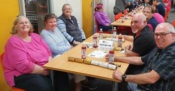 ALL SMILES: Guests at a community lunch run by the Stawell Neighbourhood House. Picture: CONTRIBUTED
