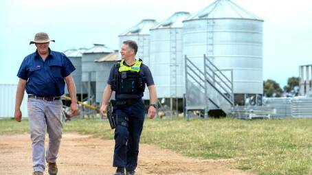Farm Crime Liaison Officer Leading Senior Constable Dan O'Bree with farmer Tim Harrington. Picture: DARREN HOWE
