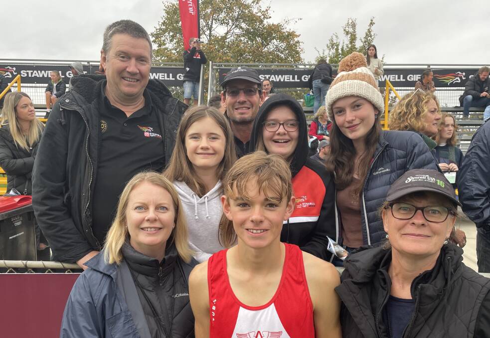 LEGACY: The Carter family at the 2022 Stawell Gift. Pictured are Ian Bell, Neil van Raalte (back row), Lucy Bell, Katie Bell, Beth Van Raalte (middle row), Mia Bell, Ben Van Raalte, Helen Carter (front row). Picture: MATT HUGHES