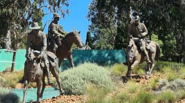 A monument to the 136,000 horses who served in the First World War at the entrance to the Australian War Memorial. Picture by Sheryl Lowe