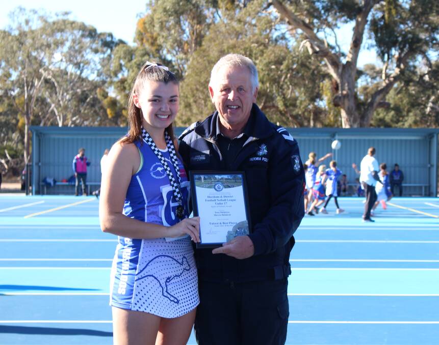 Harrow Balmoral's Tara McIntyre receives her Blue Ribbon Foundation Spirit of Netball award from Harrow police officer Leading Senior Constable Alan Perry. Picture supplied