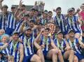 The Harrow Balmoral Southern Roos celebrate winning the 2023 HDFNL premiership with the league shield and trophy. Picture by John Hall