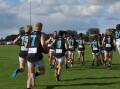 HDFNL round one teams: New players pull on new colours for the first time. Picture by John Hall