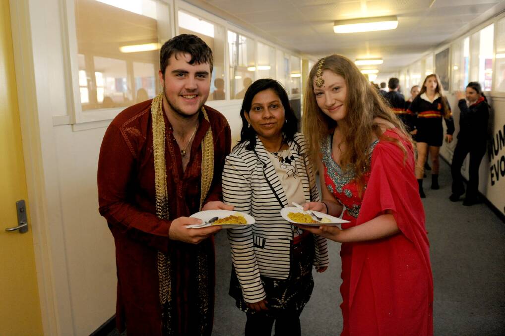 Stawell College year 12 students Riley Adamson and Erin McClure with teacher Falguni Chaudhuri. Picture: SAMANTHA CAMARRI