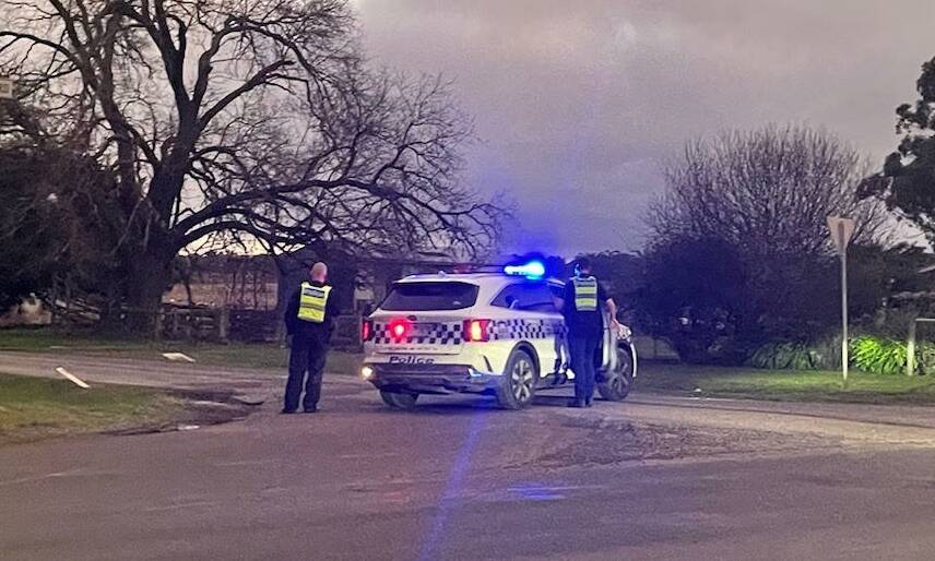 Police blocking Finchs Road at the Ballarat-Carngham Road intersection. Picture: Nieve Walton.