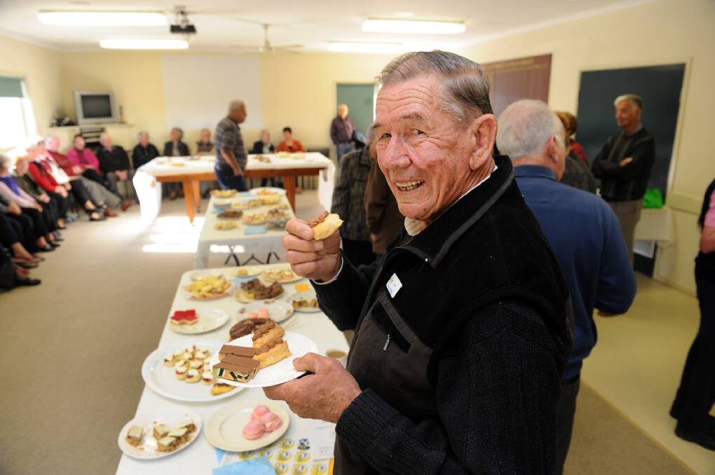 COMMUNITY-MINDED: John Dahlenburg at a Nhill Cancer Volunteer Group Biggest Morning Tea in 2013. Mr Dahlenburg was a committee member for the Nhill Anti-Cancer Council in 2006.