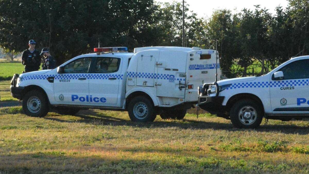 Crime scene guard: Oxley police at the property on the outskirts of Gunnedah on Wednesday afternoon. Photo: ACM