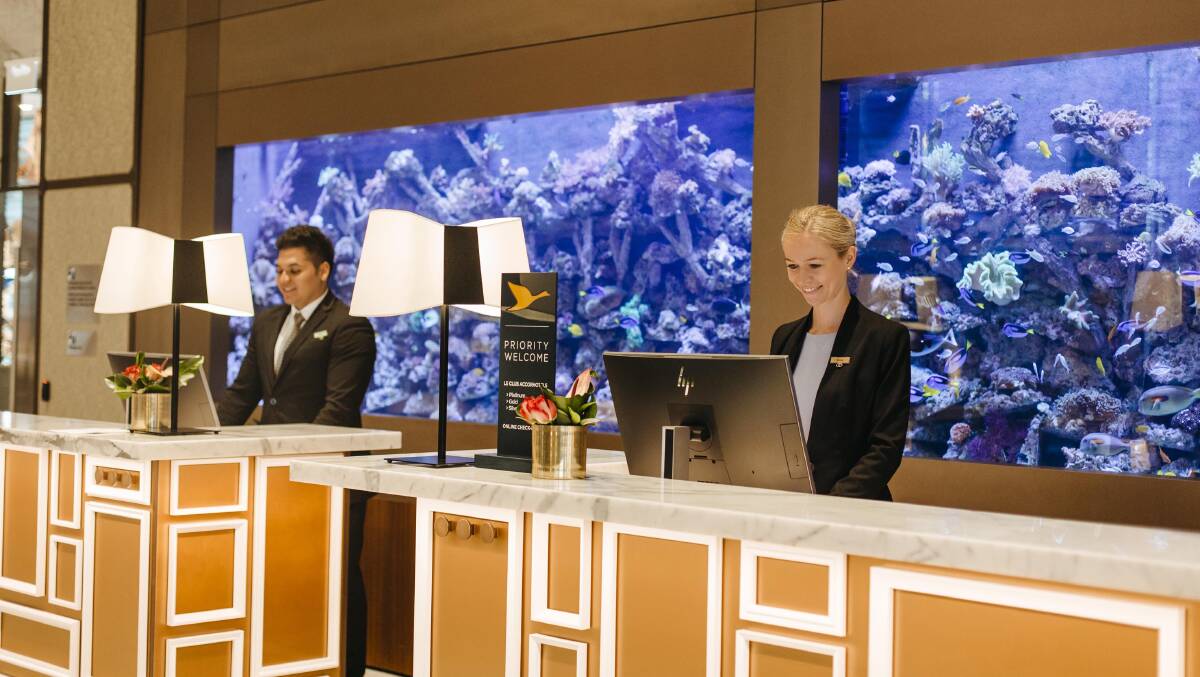 A giant fish-tank dominates the reception area in the Sofitel Sydney Darling Harbour.