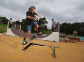 Homegrown: Oscar Simmonite trying out the DIY skate park built by locals in Port Kembla. Picture: Sylvia Liber