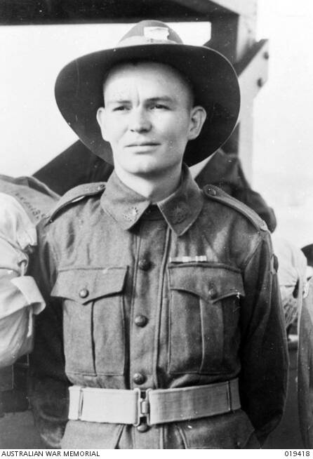 SURVIVOR: Private Colin Fleming Brien, aged 19, of the 2/19th Batallion was left for dead by Japanese executioners after the sword penetrated his vertebral column but failed to touch his spinal cord. Pictured in September 1945, most likely in Darwin. Picture: Australian War Memorial (public domain).