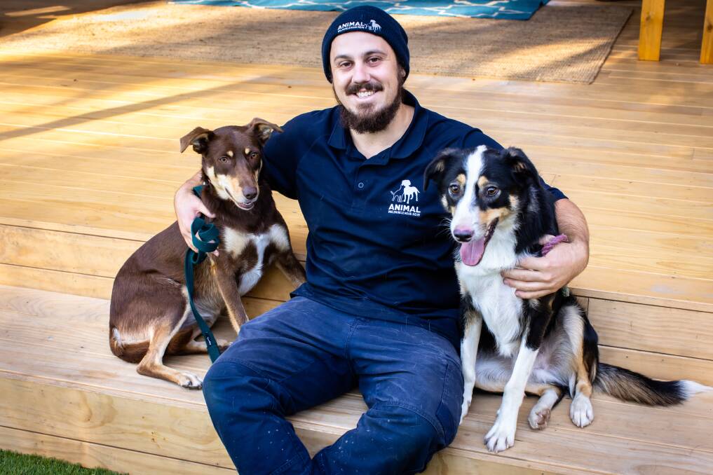 FURRY FRIENDS: Animal Welfare League NSW shelter manager Sam March with two of the beautiful pooches ready to be adopted. Picture: Ten