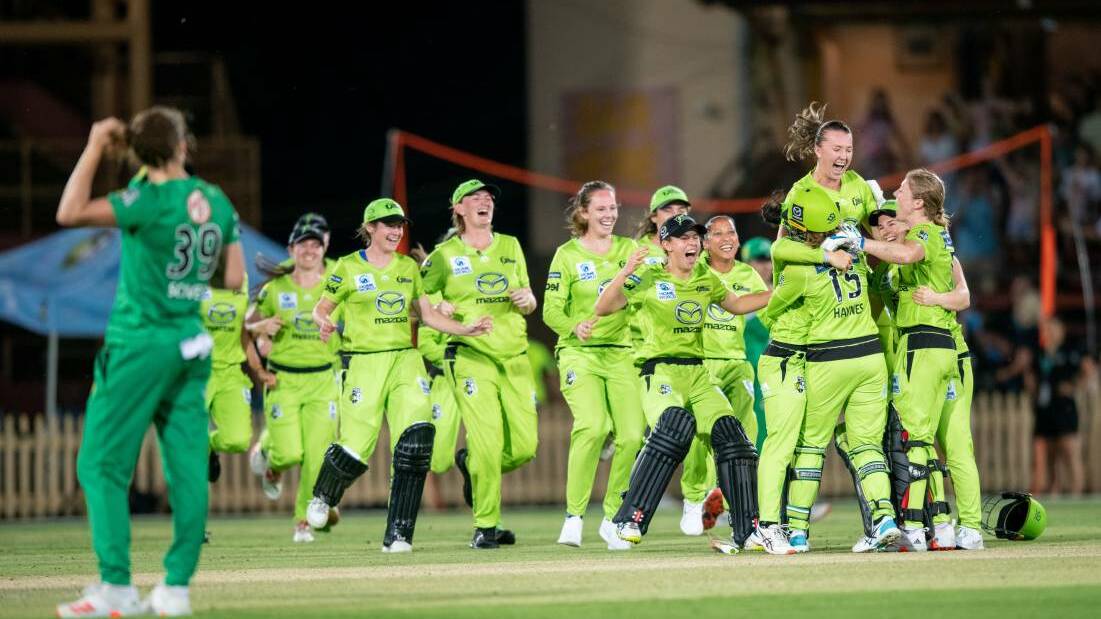 Rachel Trenaman is thrown into the air by teammates as Sydney Thunder celebrate their WBBL final win at North Sydney Oval on Saturday night. Picture: Getty Images