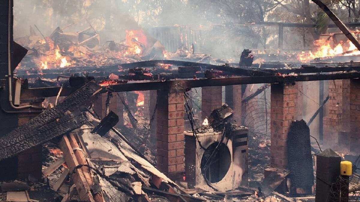  Nick Hopkins and Heike Sutherland's NSW South Coast home was destroyed.