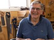 Helping others: Pete is a champ at volunteering, which to his mind means passing on his knowledge and skills in woodworking too. Photo: Supplied