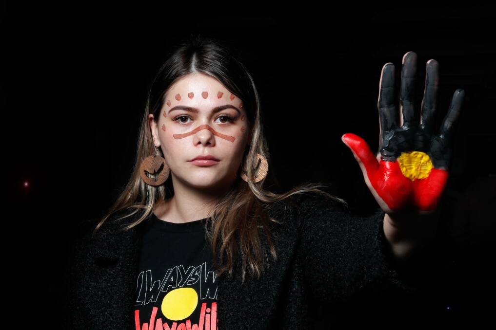 Shylee Corrigan from Gunditjmara Aboriginal Cooperative proudly wears the Aboriginal flag on NAIDOC Week 2021. Picture: Chris Doheny
