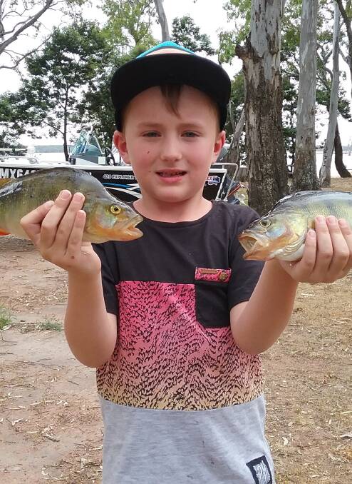 Ryder Davidson with his red fin fish from Lake Fyans.