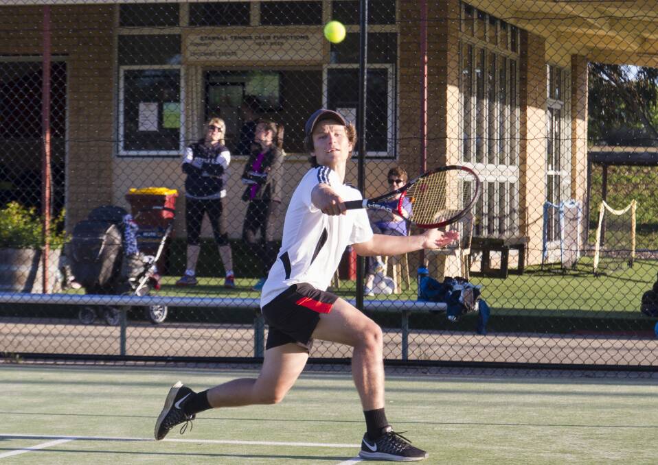 Full Stretch: Jesse Barber reaches for a wide backhand for Stawell Toyota. Barber won two of his three matches.