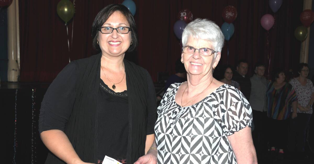 Hand over: Acting CEO of Stawell Regional Health Janette Feeny accepts a cheque off Senior Citizen Line Dancing event organiser Janette Ekman.