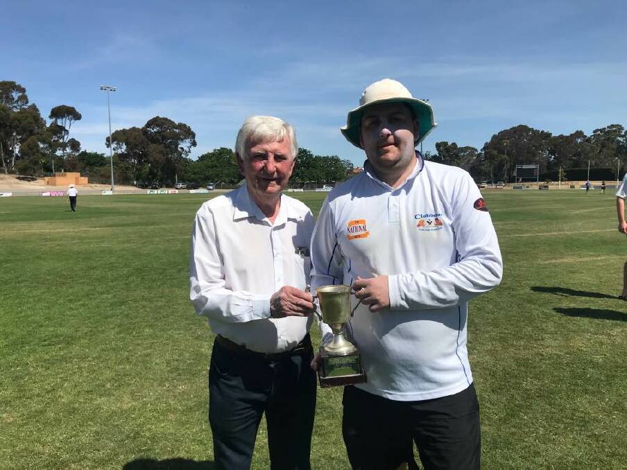 TAKING HOME THE PRIZE: Henry Gunstone with Youth Club captain, Nic Baird. Picture: SUPPLIED