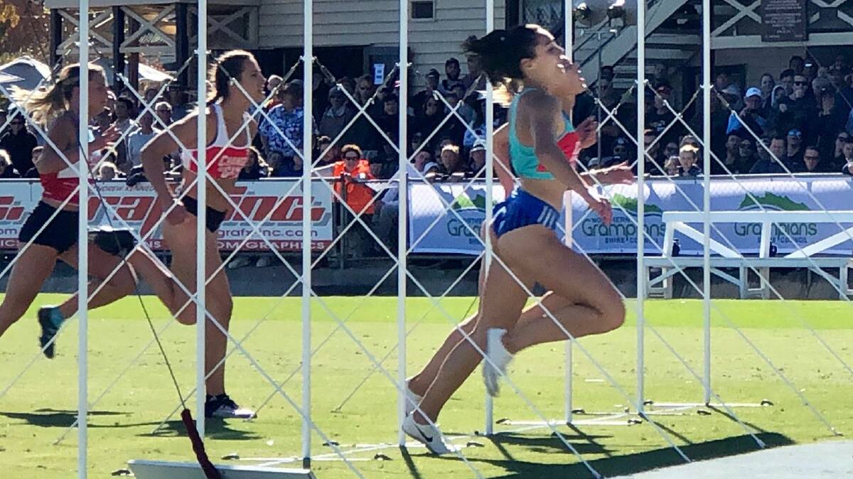 Alexa Loizou powers through the gates to win the Stawell Women's Gift off 5.75 metres. Picture: @StawellGift on Twitter