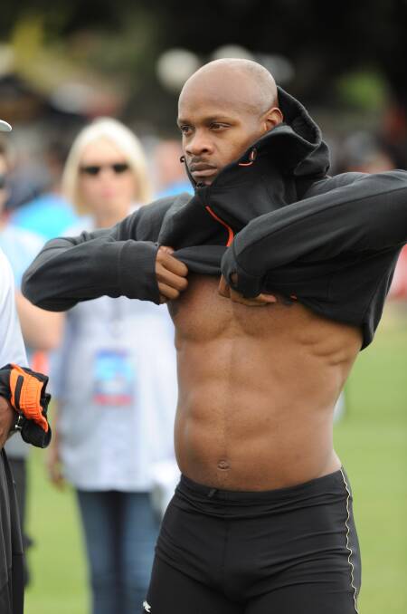 STAR FOCUS: Jamaican sprinter Asafa Powell, once the world's fastest man, reaches the 2013 Stawell Gift semis before a hamstring strain. Picture: Lachlan Bence
