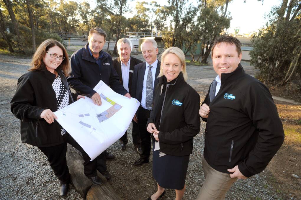 Support: Amanda Western,  Troy Cole, Cr Murray Emerson, Melbourne University's Ray Volkas, Federal Minister for Regional Development Fiona Nash and Andrew Broad inspect plans for a dark matter laboratory in the Stawell gold mine. Picture: PAUL CARRACHER.