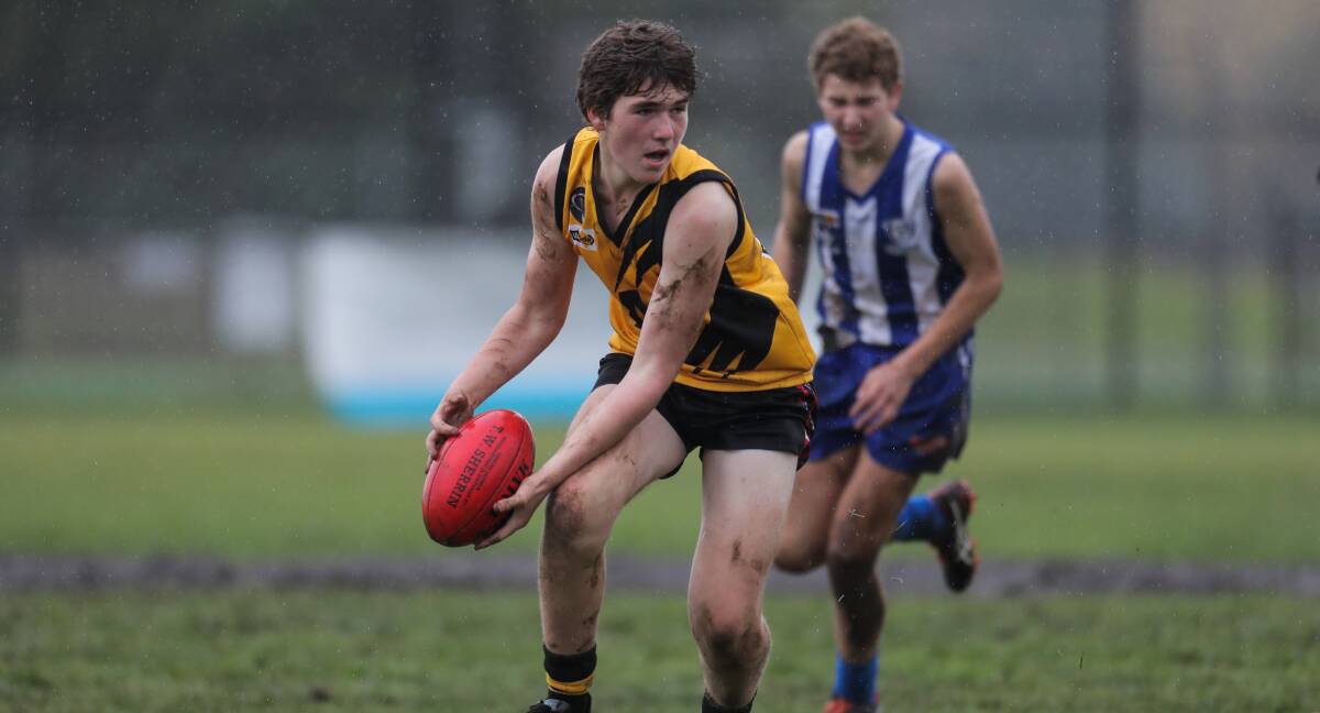 OPTIONS: Mininera under-16 player Cody Ledger gets control of the wet ball during the Western District Junior Carnival. PICTURE: Rob Gunstone