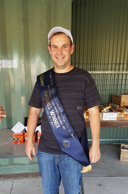 QUICK REFLEXES: Stewart Forbes with his sash after he won the overall double barrel event at the Good Friday meet. 