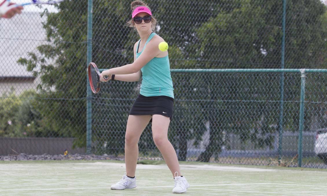 STEADY: Ararat's Gracyn Dowling lines up her shot during the 2016-17 Ararat and District Tennis Association season. Picture: Peter Pickering