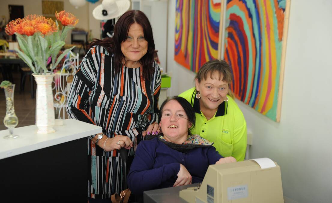 MARKETABLE SKILLS: Shirley Haebick, Bev Tollbring and Katie Mutch work the cash register at Horsham business Beyond Community Inclusion. Picture: ALEXANDER DARLING