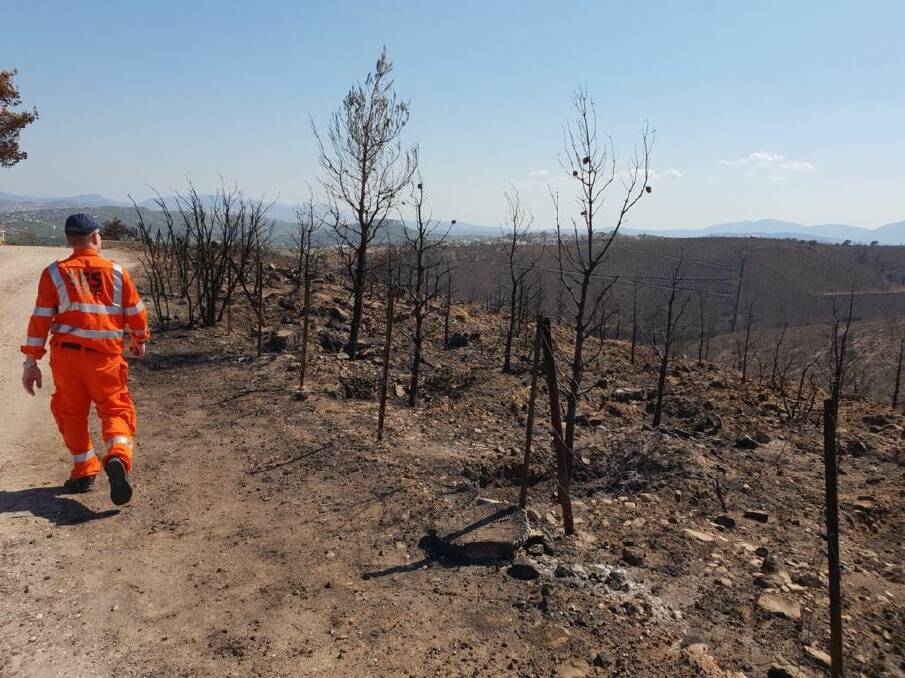 State Emergency Service Stawell Unit member John Hooper surveying the impact of the devastating fires in Mati, Greece. Picture: CONTRIBUTED 