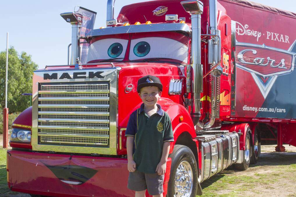 Cars: Ethan Parker, 5, met his favorite character from the movie Cars. Mack visited St Patrick's Primary School. Picture: Peter Pickering. 