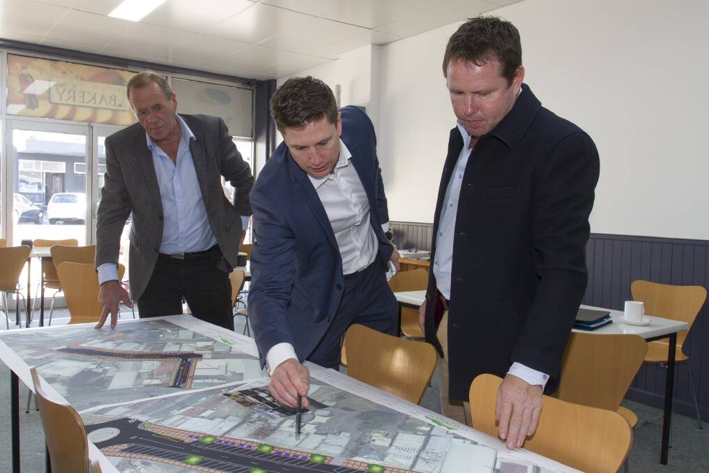 Streetscape plans: The Northern Grampians Shire Council’s CEO Michael Bailey and mayor Tony Driscoll showed Mallee MP Andrew Broad their streetscape plans for Stawell. Picture: Peter Pickering. 