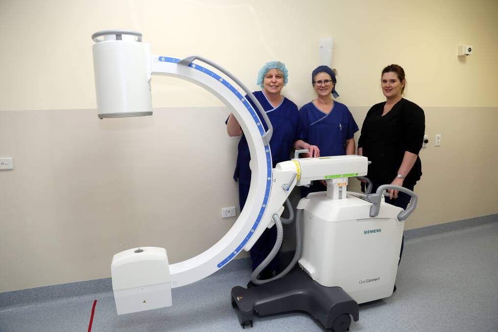 Stawell Regional Health instrument technician Stephanie Rathgeber, associate nurse unit Sally Hamilton and chief radiographer Marsole Greyvensteyn with the image internsifier. Picture: CONTRIBUTED 