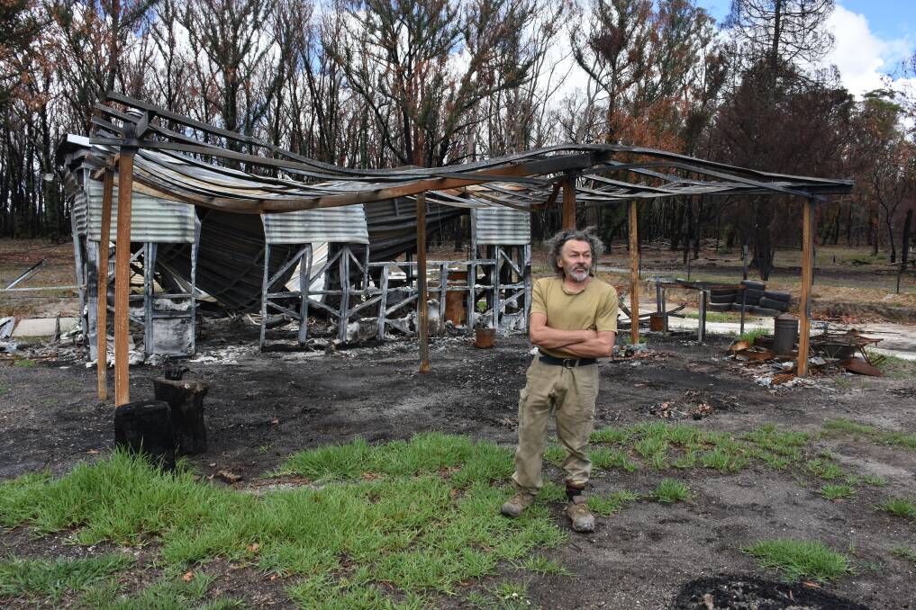 Richard Cork lost one of his three houses in Torrington to last year's inferno. 