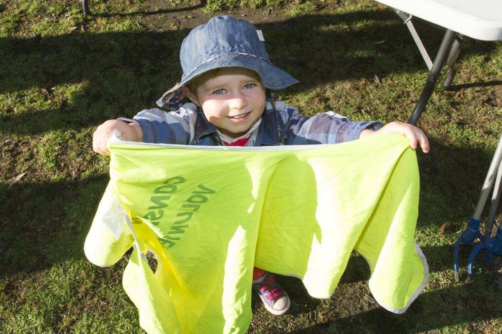 LITTLE HELPER: Young Maggie gets kitted out for the Clean Up Australia Day event at Halls Gap at the weekend. Picture: Peter Pickering
