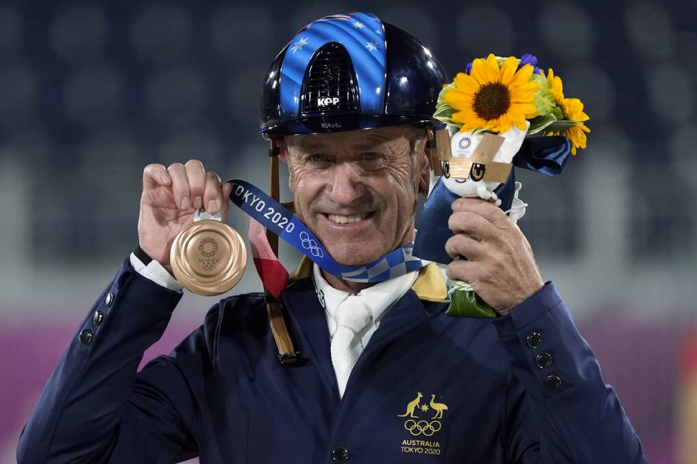 BRILLIANT: Andrew Hoy won his first Olympics medals since the Sydney 2000 games with an outstanding effort in Tokyo. Picture: AP