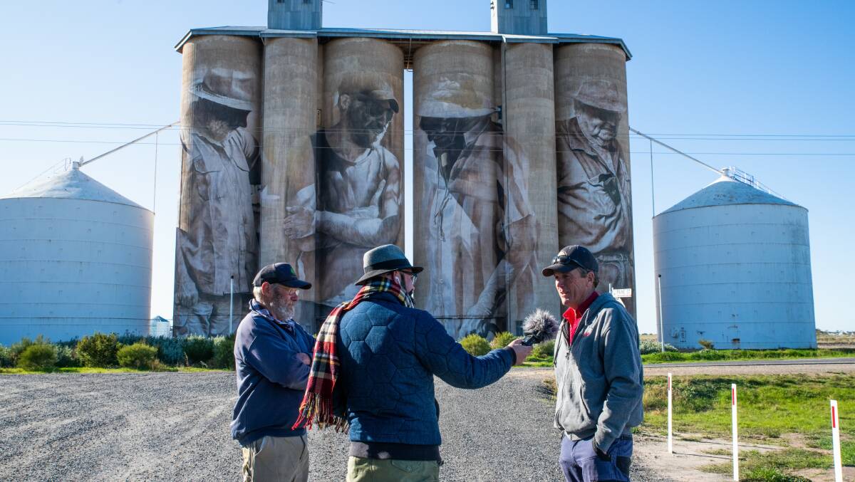 Cutting edge: Storytowns founder Jarrod Pickford (middle) has produced a series of podcasts showcasing the towns, and the people, behind the Wimmera Silo Arts Trail. PIcture: Storytowns