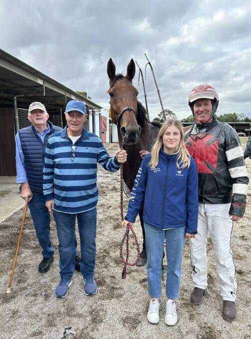 Trainer-driver Michael Bellman (right) with Trevor Farah, Terry Croton and Shannon O'Sullivan after the victory of Jazspur at Hamilton. Picture supplied by Hamilton HRC