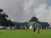 Stubble burn offs created a surreal backdrop at the games between Woorndoo-Mortlake at Tatyoon on Saturday, April 20. Picture by Ben Fraser