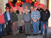 Twelve present and past presidents of the Stawell Warriors Football Netball Club. Picture by Ben Fraser