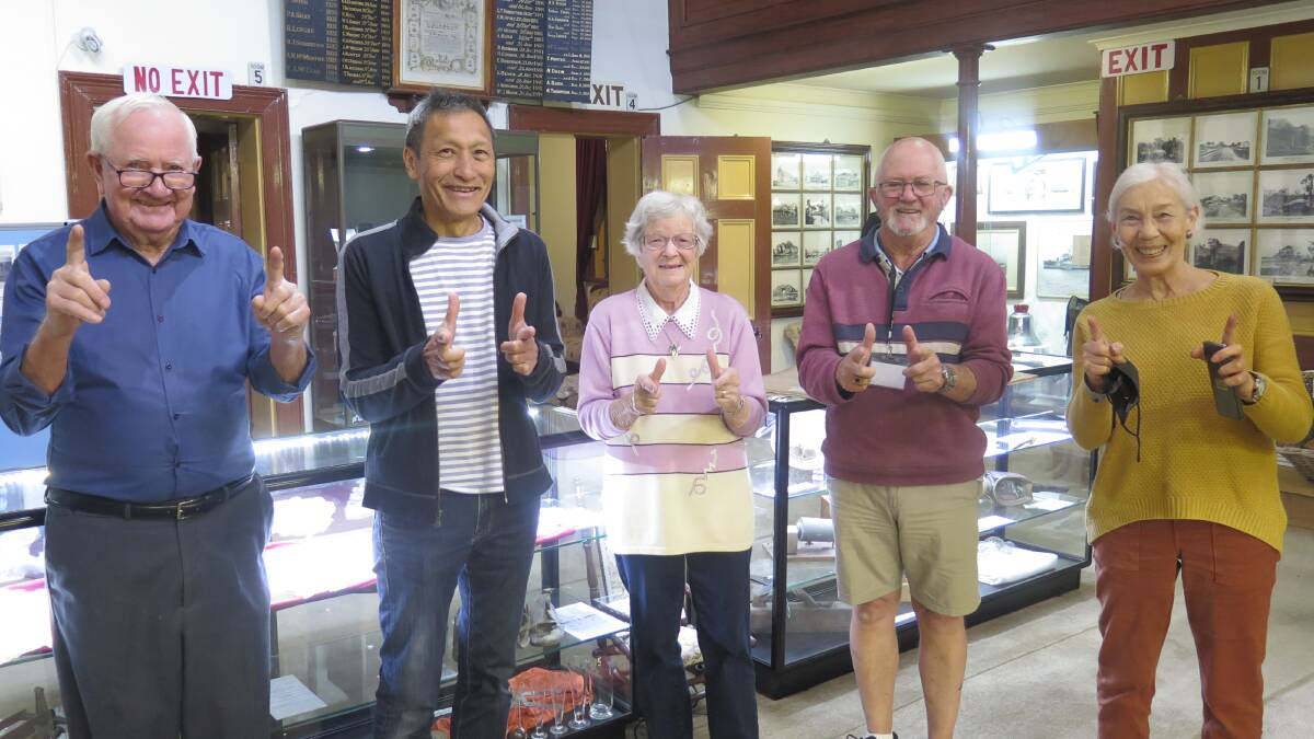 SPECIAL VISIT: Stawell Historical Society's Jim Melbourne, purple Wiggle Jeff Fatt, Dorothy Brumby, Greg Robson and Kate Van Dyck had a great time looking through Mr Fatt's history. Picture: CONTIRBUTED
