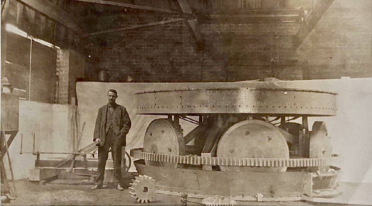 HISTORY: Robert Gray was a fitter and turner at Kay's Foundry, Stawell in the early 1900s. He is pictured with a piece of equipment build for the Bulolo goldfields in New Guinea.