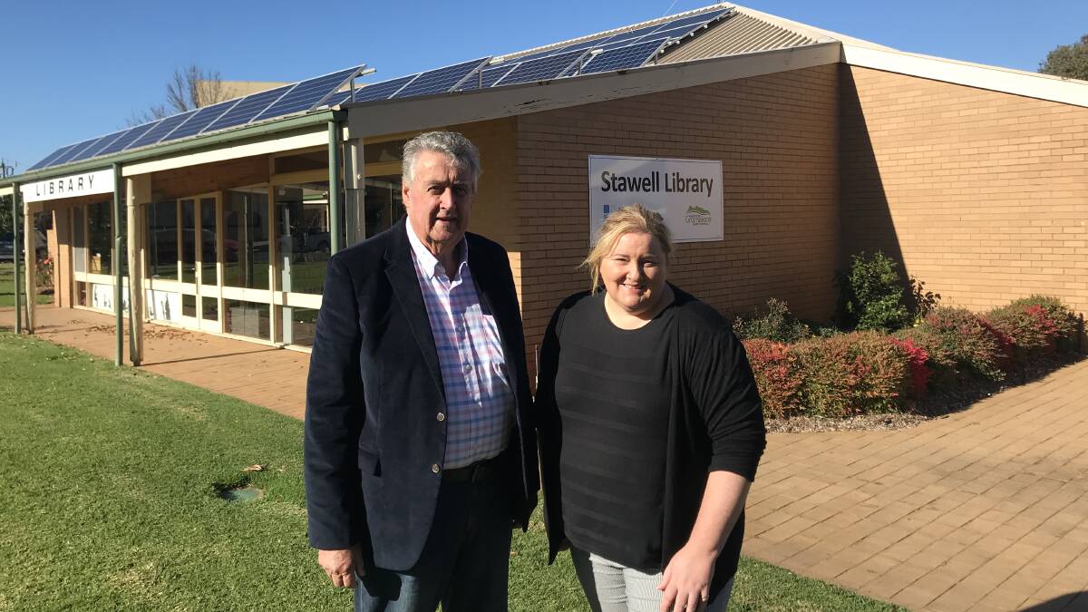 FUNDING: Northern Grampians Shire Council Mayor Murray Emerson and Librarian Kerry Wilson are estactic with the funding announcement. Picture: CASSANDRA LANGLEY