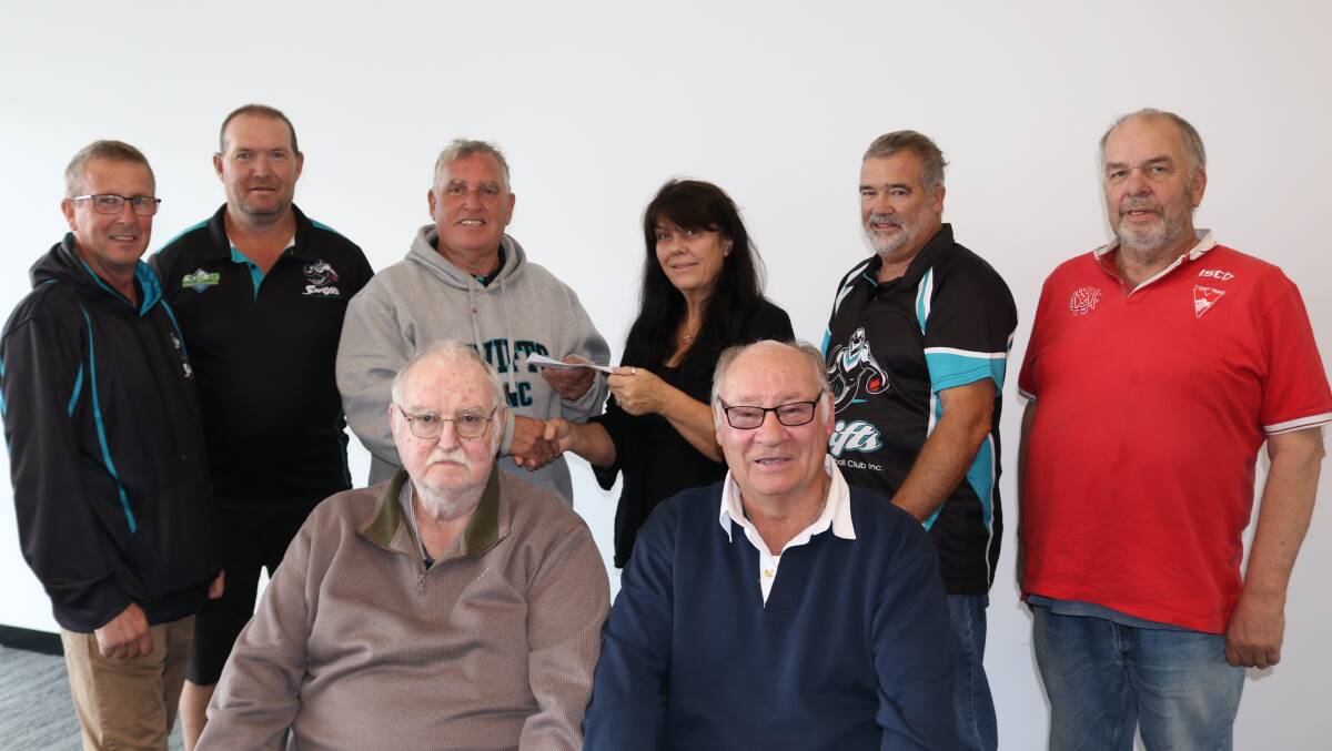 PRESIDENTS AND REPRESENTATIVES: Robert Carey, Steve Hoffman, Ian (Daffy) ODonnell, Sally Neagle, Brian Barber and David ODonnell with Graeme Anyon and Trevor Skurrie at the front. Picture: TRISH RALPH